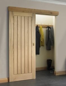 Cloak room with wooden sliding door